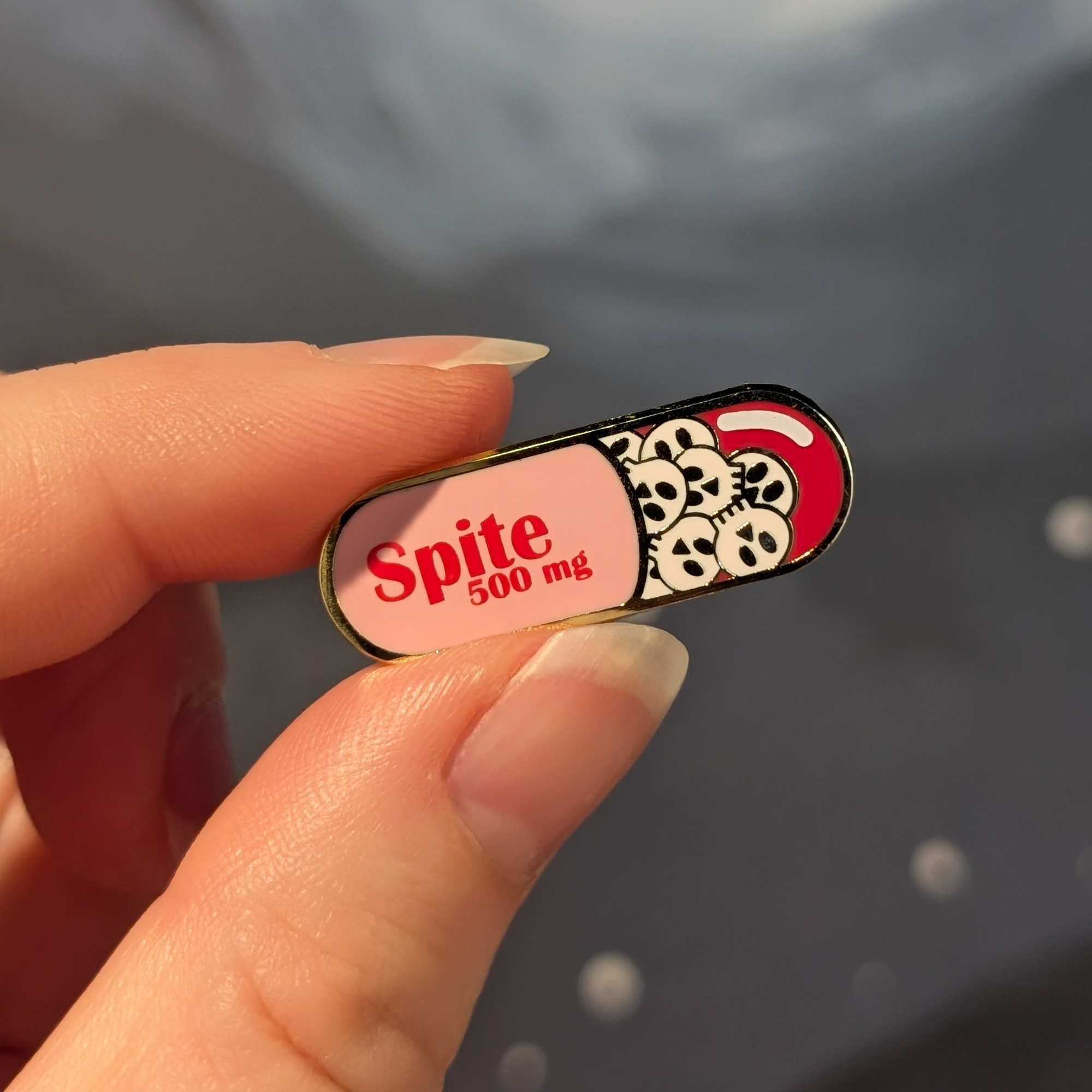 Spite Pill hard enamel pin